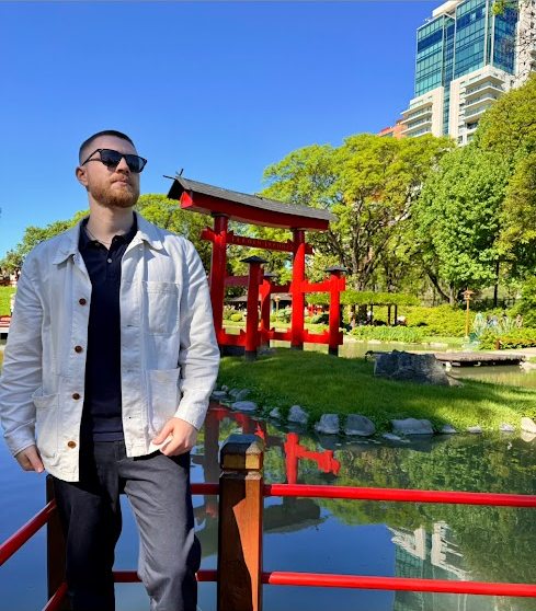 The Bad Digital Nomad on a footbridge in a Japanese garden